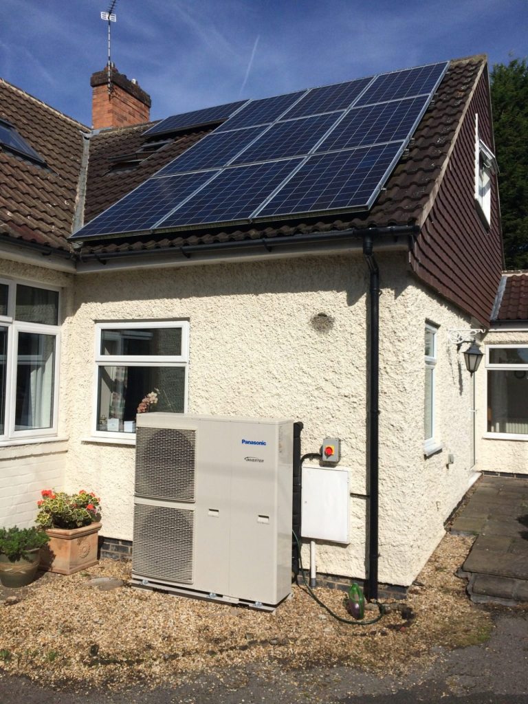 House with solar panels and an air source heat pump. Energy efficent, lower utility bills. 